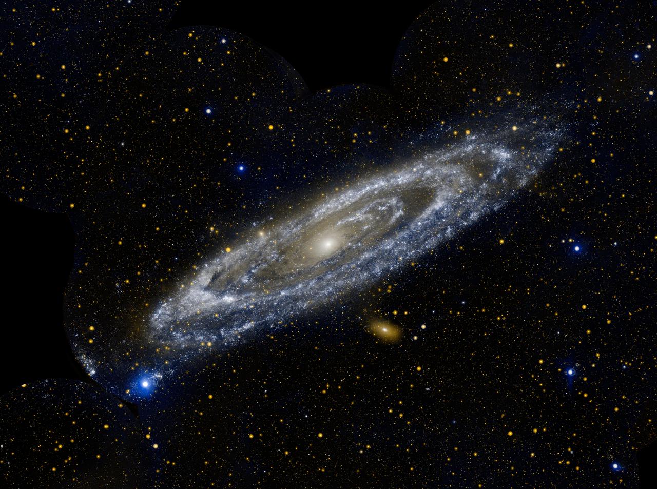 Bir galaksi örneği olan Andromeda'nın GALEX gözlemlerinden birleştirilen morötesi görüntüsü. Mavi uzak morötesini, turuncu yakın morötesini temsil eder; gözle görülen doğal renkler değildir (PIA15416).